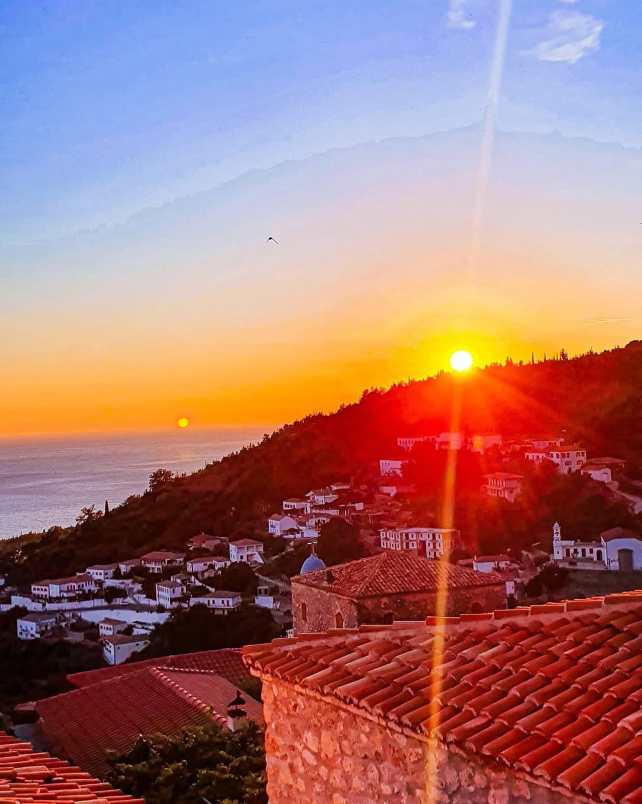 Dhermi sunset village view